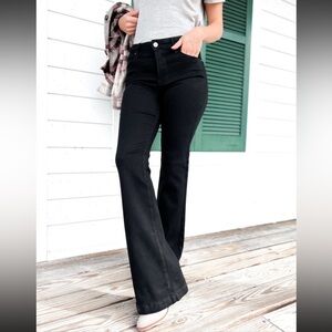 Risen black denim flare pants